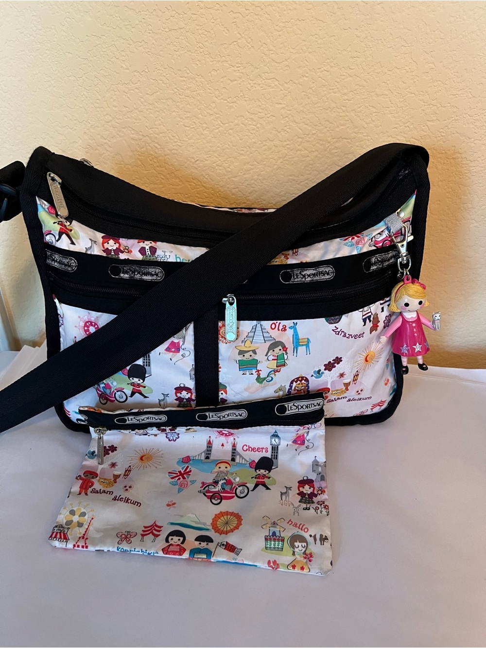 Lesportsac X Disney It’s A Small World “Well Wishes” Deluxe Everyday Bag w/charm